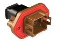 Brown thermoplastic DIP Connector featuring multiple terminal types designed for secure packaging and operation in demanding environments